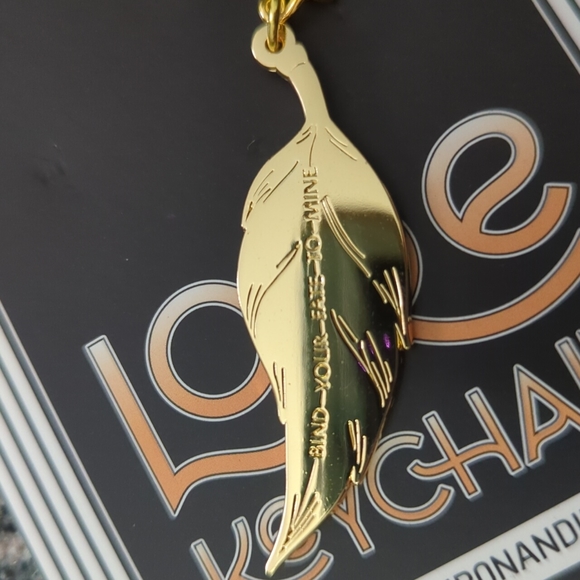 3/$25 Lore Keychain - Picture 2 of 2